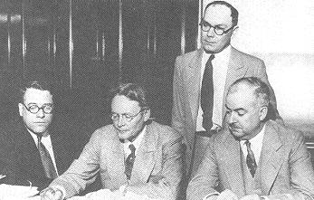 Left to right: Elmer L. Irey, George E. Q. Johnson, Frank J. Wilson, and Arthur P. Madden